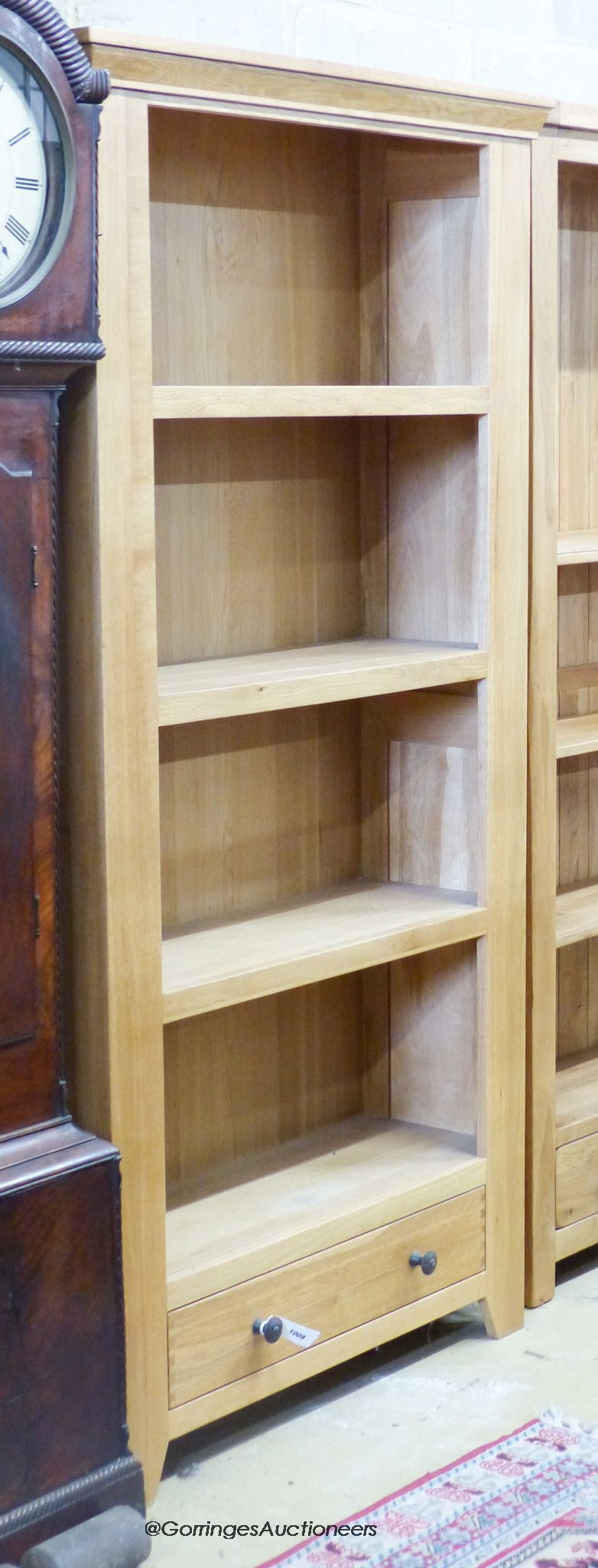A contemporary light oak open bookcase, length 98cm, width 35cm, height 190cm
